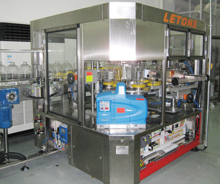 回轉式熱溶膠貼標機